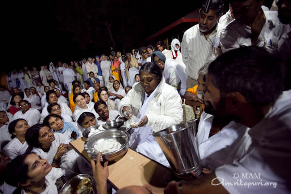 Amma during an evening stop making Kozhukkatta en route to New Delhi