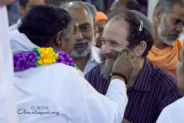 Amma giving darshan