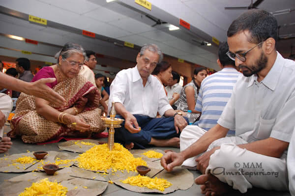 Devotees participating in five Lalita Sahasranama archana during the brahmasthanam festival
