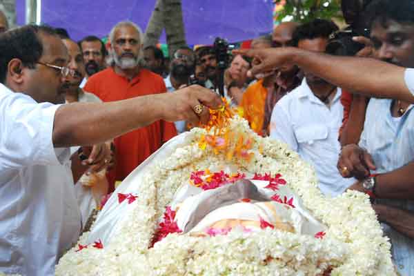 Family members offering flowers