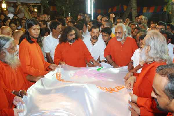 The swamis from Amma's order paying their last tributes to a man who was like a father to them