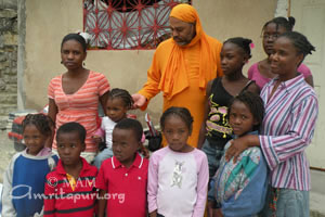 Br. Dayamrita with children in Haiti