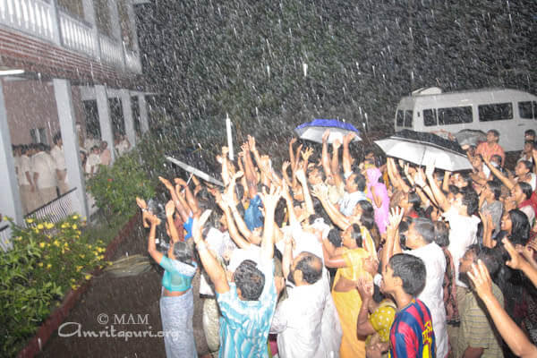 Praying for the shower of grace while standing in the rain shower