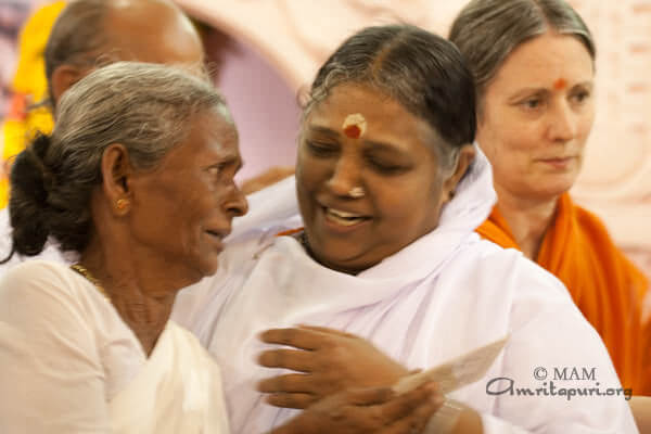 Amma giving away the Amrita Nidhi pensions