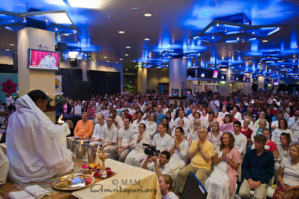 Amma blessing the water for Atma puja