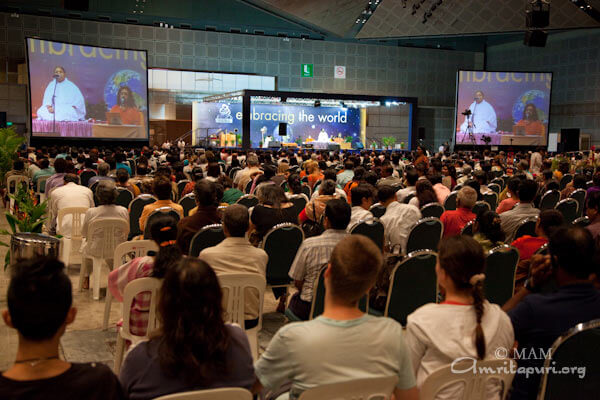 Amma giving satsang in Singapore