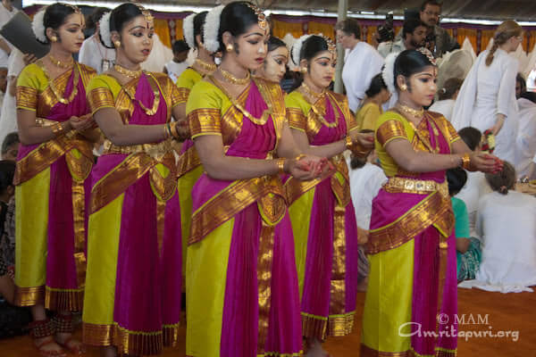 Students of Amrita Speech and Hearing Improvement school performing a dance for Amma