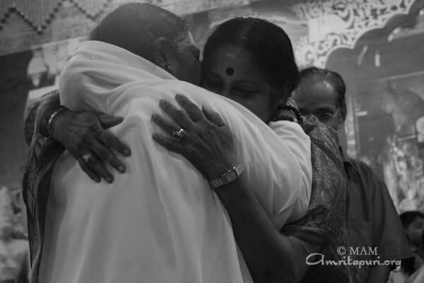 Amma giving darshan