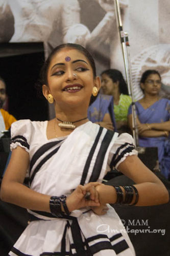 Folk dance by an Amrita Vidyalayam kid