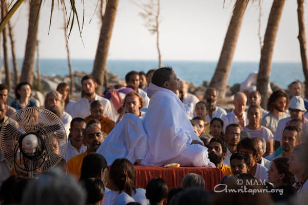 Amma meditating at te beach