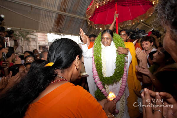 Arati after the pada puja