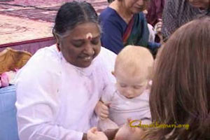 Amma with a baby in Boston, 2010