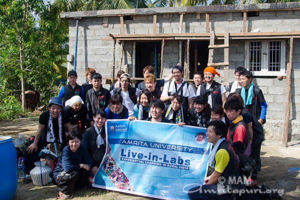 Japanese student volunteers build 14 houses for families in need
