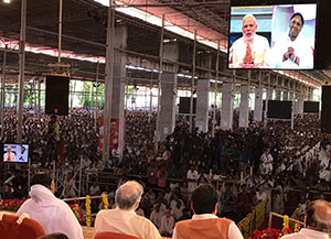 Devotion to God and dedication to the poor is the message of AMMA – Narendra Modi