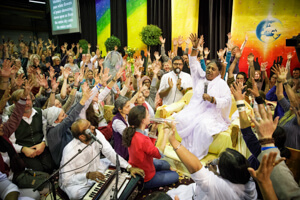 First melt in love and then be molded by knowledge: Amma in Munich
