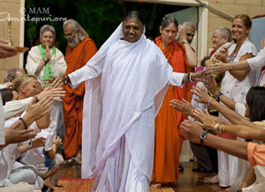 Amma to visit Australia & Singapore