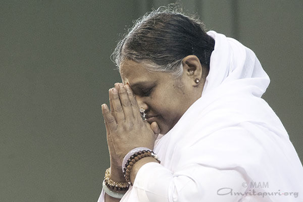 Amma praying