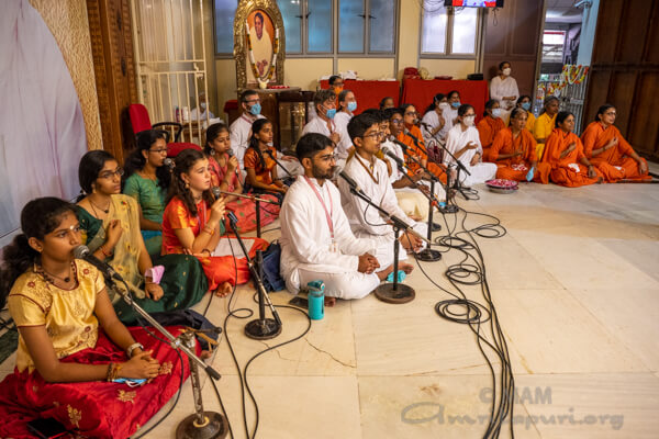 Ashram children and youth chanting Vedic mantras