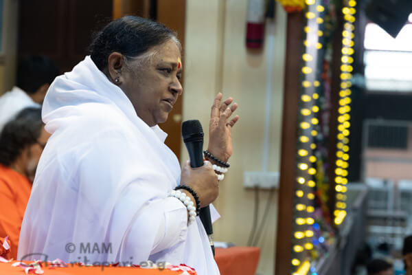 Amma speaking to those present