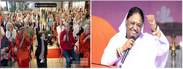 Amma talking to the Italian devotees via video link live from Amritapuri