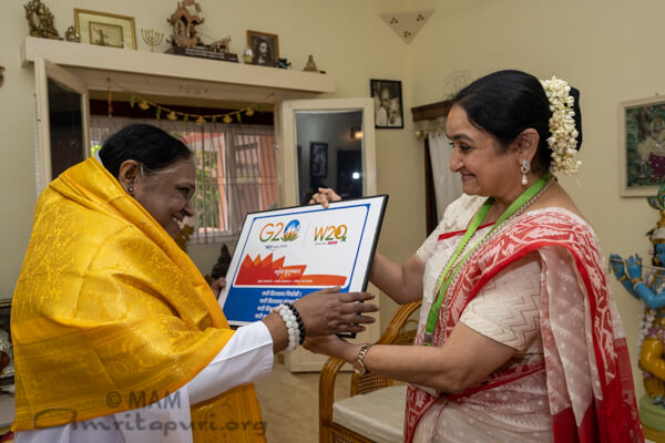 Sandhya, the chair of W20, meets Amma, the chair of C20