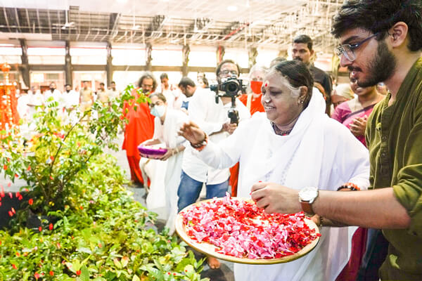 Amma blessing saplings during Vishu celebrations
