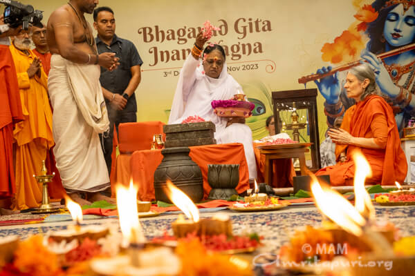 Amma conducting a puja in Amritapuri