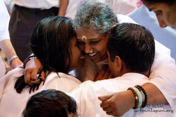 Amma giving darshan