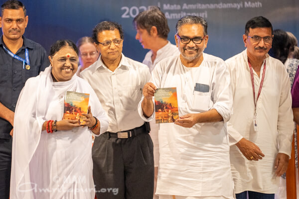 Amma releases landmark book on Indian Legal Philosophy