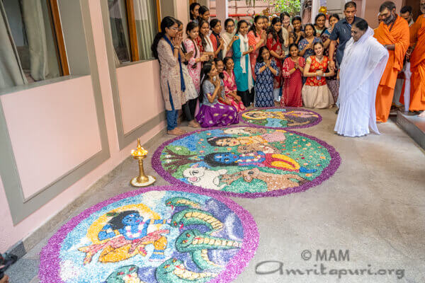 Onam arrives at Amritapuri with flowers, creativity, and devotion