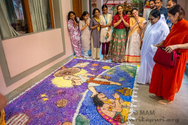 Onam arrives at Amritapuri with flowers, creativity, and devotion