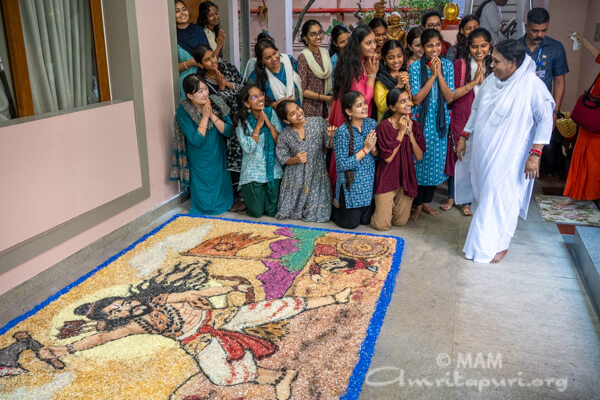 Onam arrives at Amritapuri with flowers, creativity, and devotion