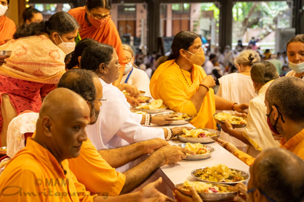Amma serving prasad