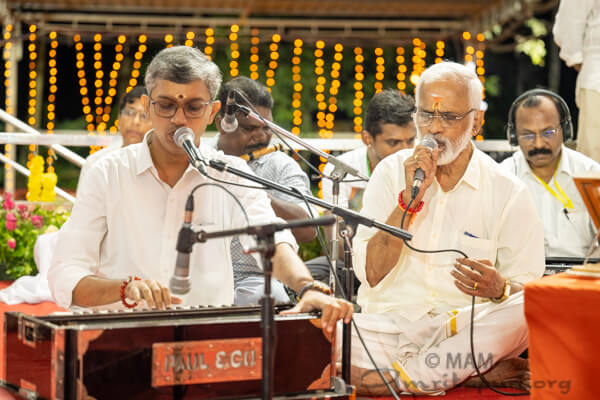 T. S. Radhakrishnan and his son singing for Amma