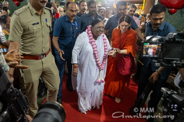 Amma on the way to the stage