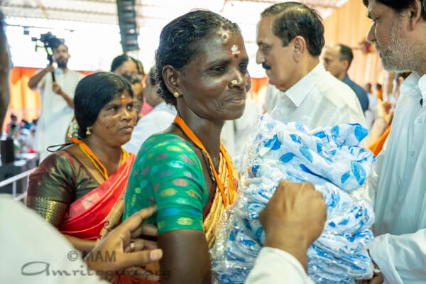 Receiving new saris with bliss